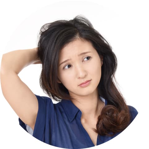 悩んでいる女性